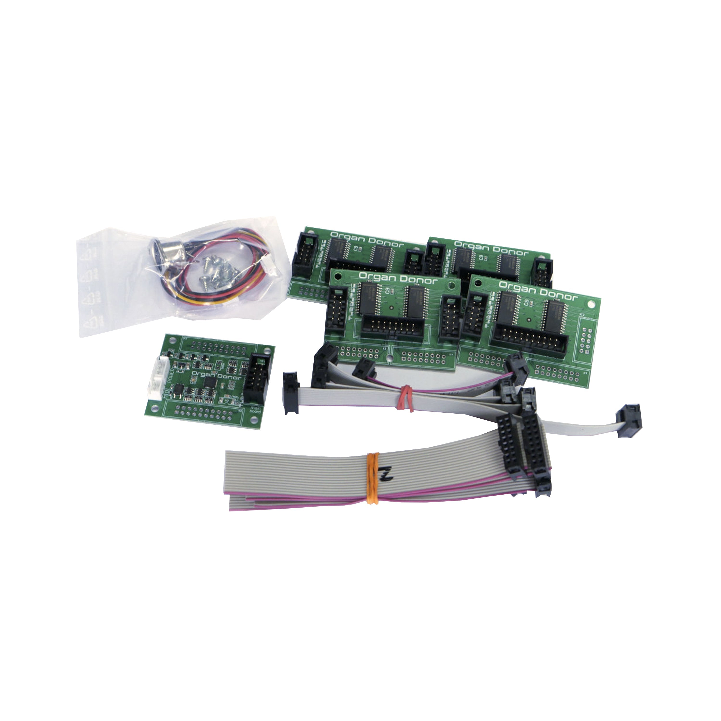 Four printed circuit boards, two ribbon cables, and a small bag with screws and a sensor are arranged on a white background.