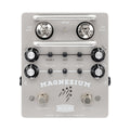 Gray guitar effects pedal with knobs, two tubes, two footswitches, and labeled controls including volume, gain, treble, mid, and bass.