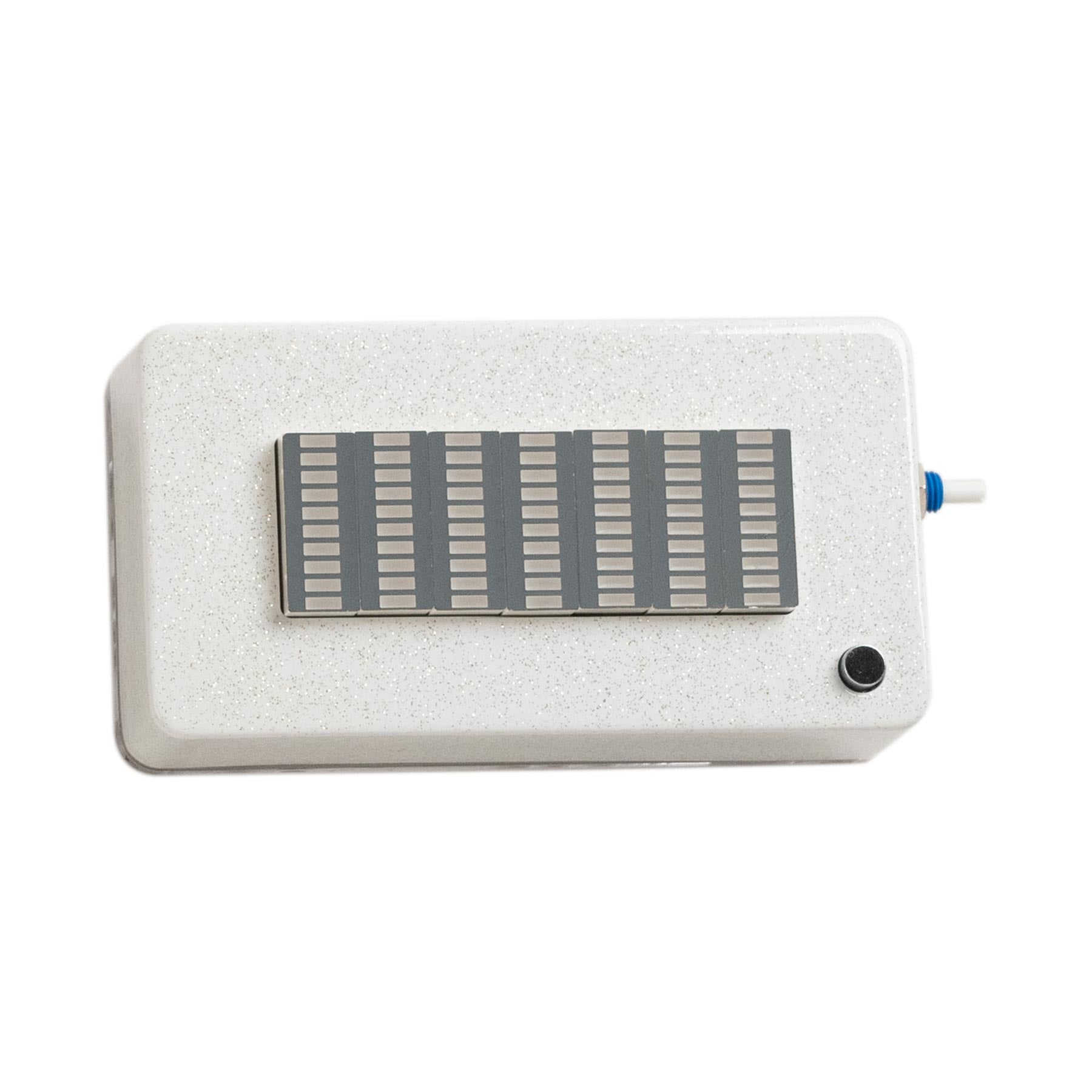 Rectangular white electronic device with a gray LED visualizer display, a black knob, and a small coaxial connector on the side.