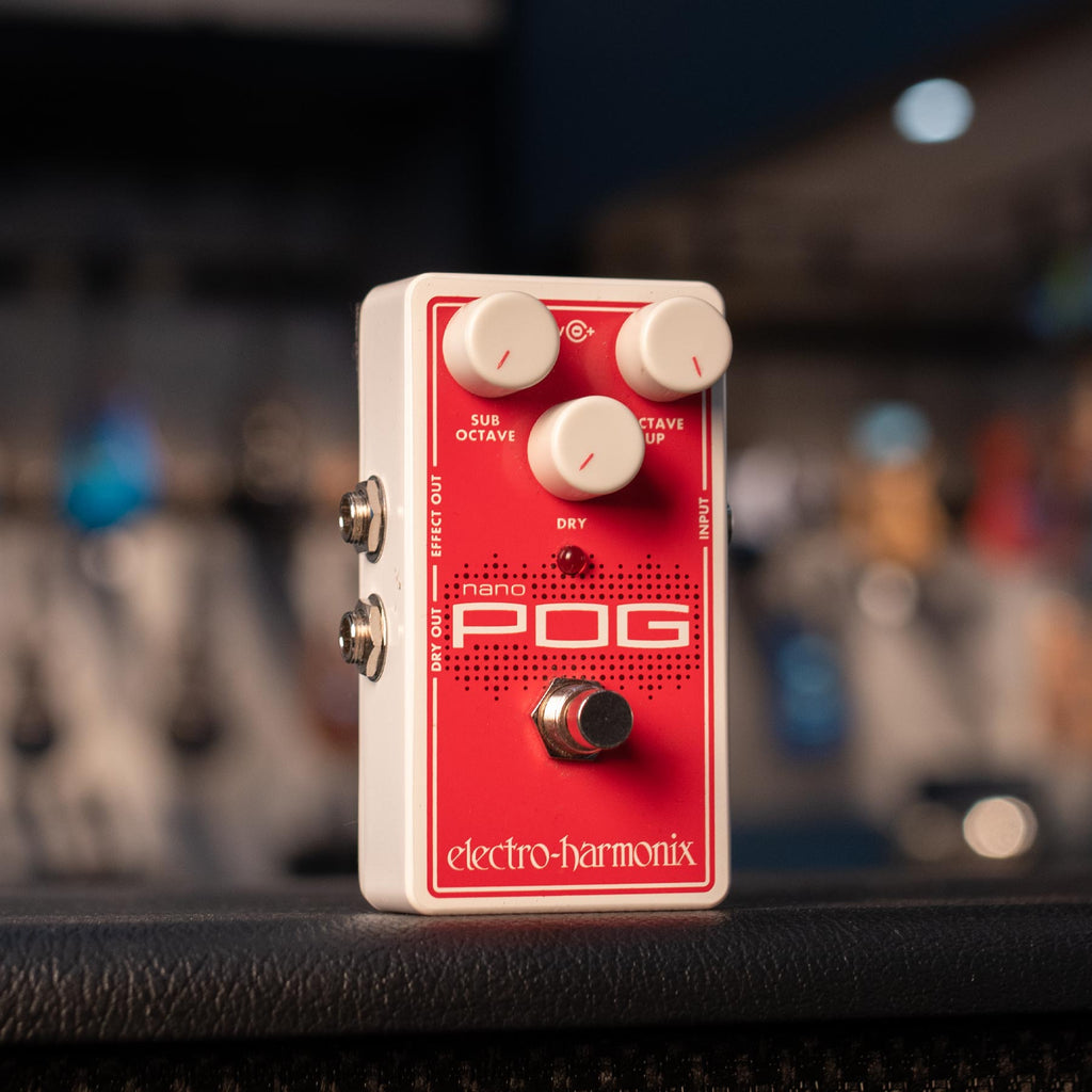 Red and white guitar effects pedal with three white knobs and a footswitch labeled 'nano POG'.