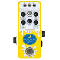 Yellow guitar effects pedal with white drip design and multiple knobs and switches labeled for various audio effects.