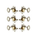 Set of six silver and gold metal guitar machine heads arranged in two columns of three.