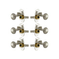 Six nickel and gold guitar tuning pegs arranged in three pairs on white background.