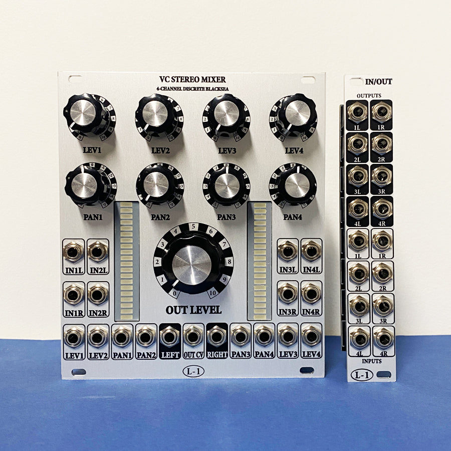 Silver VC stereo mixer module and matching I/O expander module with knobs and multiple audio jacks