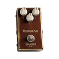 A brown and gold guitar effects pedal with three white knobs, a footswitch, and Vemuram branding.