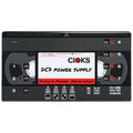 Black rectangular power supply unit with numbered power outputs and label reading CIOKS DC7 Power Supply