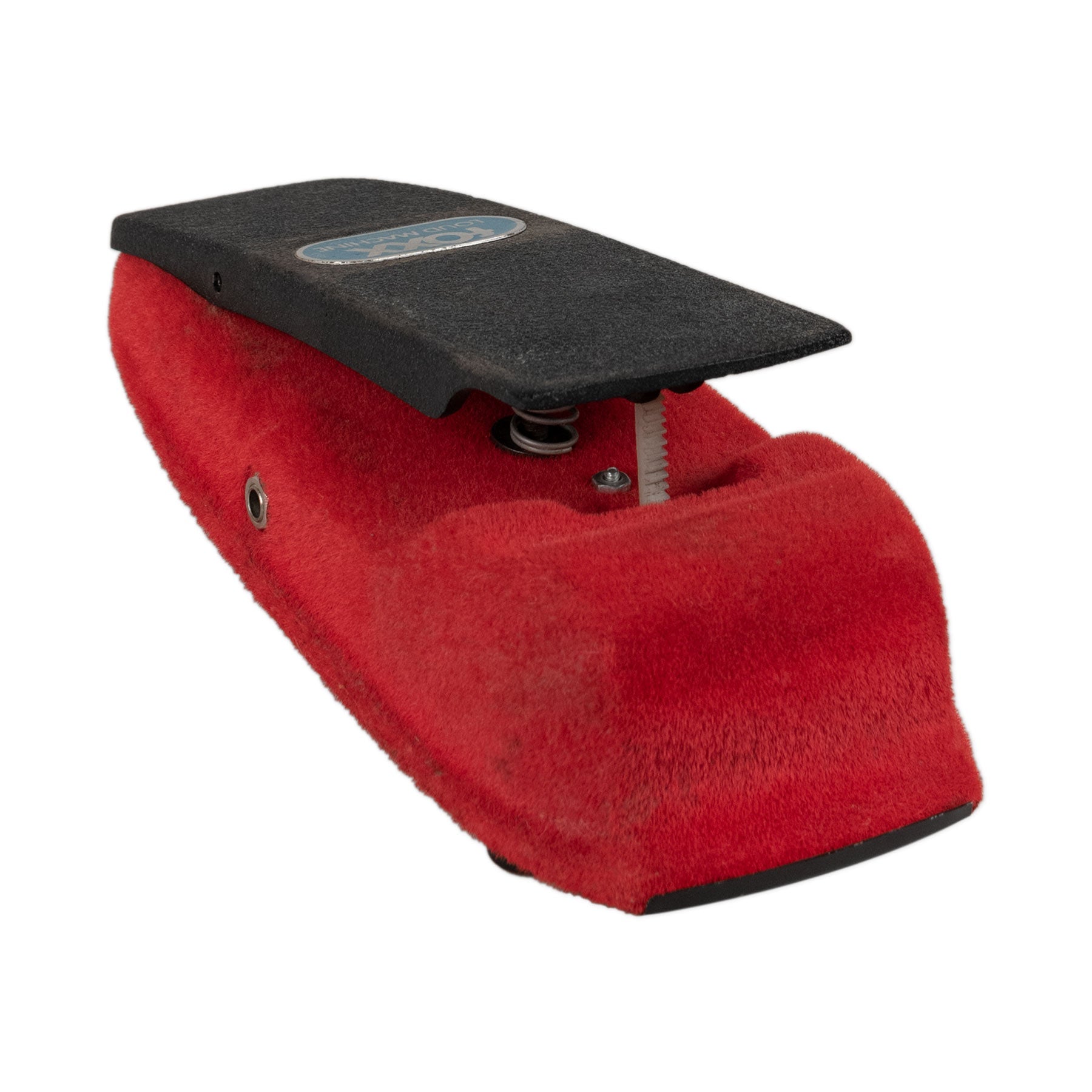 Red pedal with black foot pedal and FOXX Loud Machine label on top viewed at angle