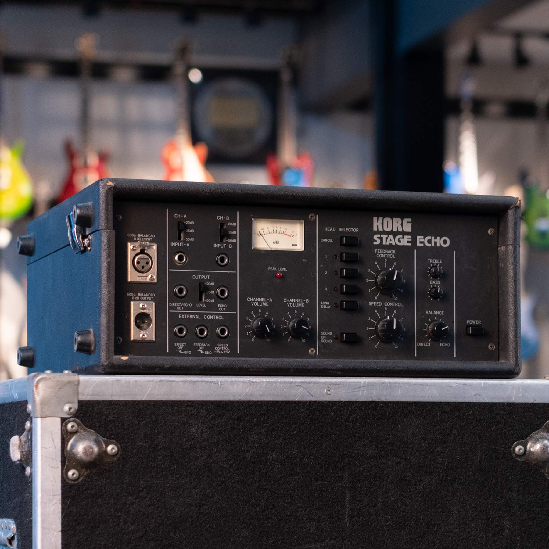 Front view of a vintage Korg Stage Echo audio effects unit with knobs, switches, and multiple input/output jacks.