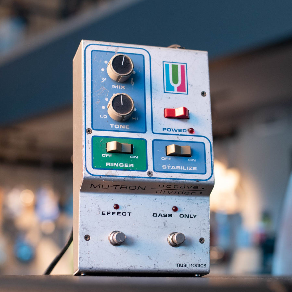 Vintage Mu-Tron octave divider pedal with mix and tone knobs, toggle switches, and footswitches.