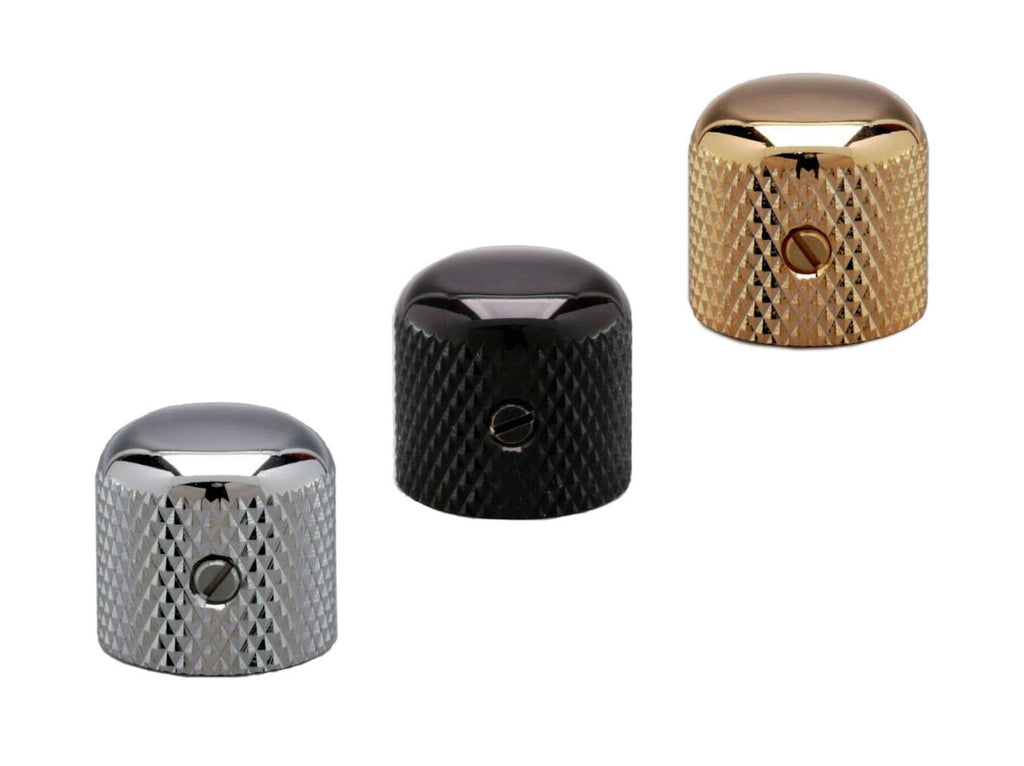 Three metal knurled dome knobs in silver, black, and gold colors arranged on a white background.