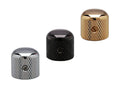Three metal knurled dome knobs in silver, black, and gold colors arranged on a white background.
