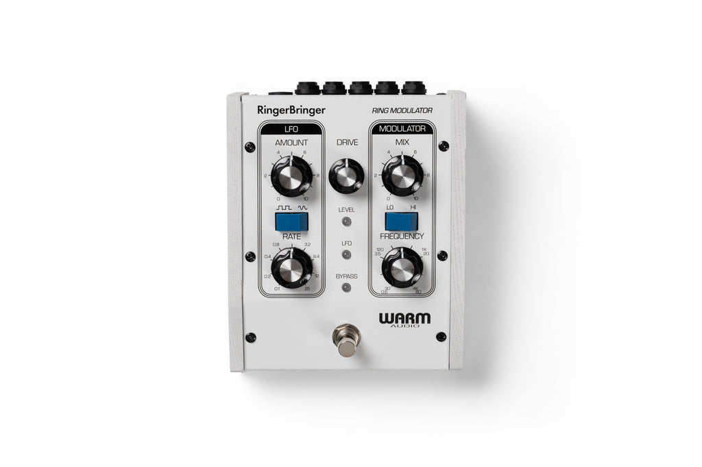 White modulation pedal with five knobs, two blue toggle buttons, a foot switch, and black text controls.