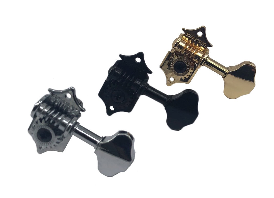 Three guitar tuning machine heads in gold, black, and chrome finishes shown isolated on white background.