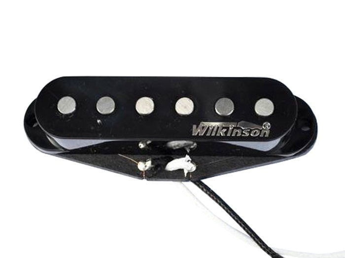 Black guitar single coil pickup with six pole pieces and wired leads labeled Wilkinson.