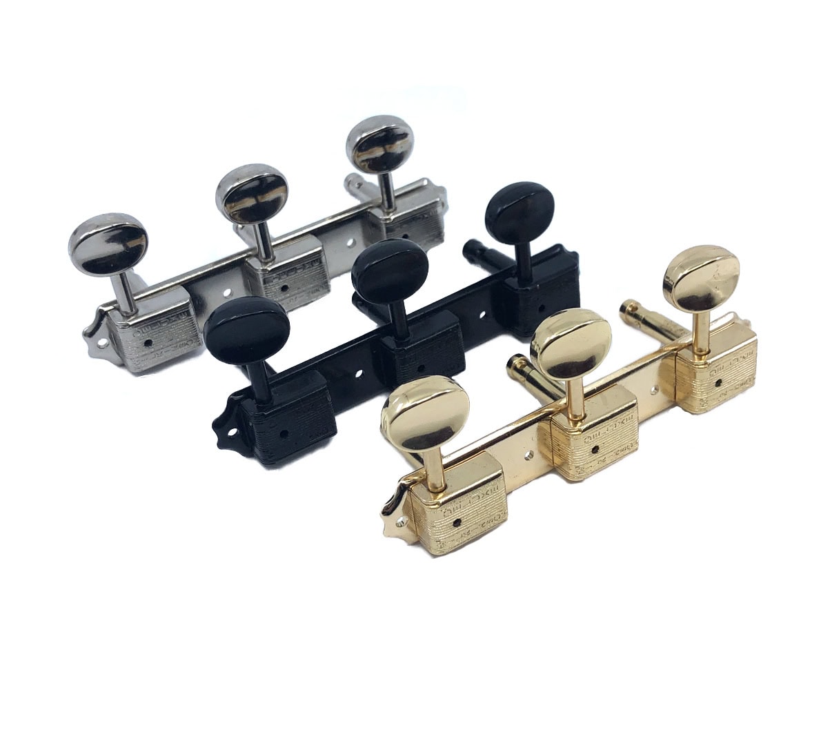 Three sets of guitar tuning pegs in silver, black, and gold, each set with three pegs attached to a metal base.