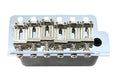Chrome metal guitar tremolo bridge with six adjustable saddles on a white background.