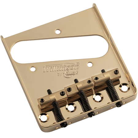 Gold metal guitar bridge plate with three brass saddles and screws, labeled Wilkinson by Schaller.
