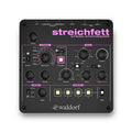 Top view of a Waldorf Streichfett string synthesizer with various knobs, switches, buttons, and audio and MIDI ports.