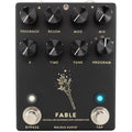 Black guitar effects pedal with eight control knobs, two footswitches, and indicator lights.