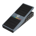 Gray analog volume pedal with black rubber grip and multiple 1/4 inch input and output jacks on side.