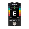 Black Walrus Audio Canvas Tuner pedal with color bars and digital display showing note E and mute indicator.