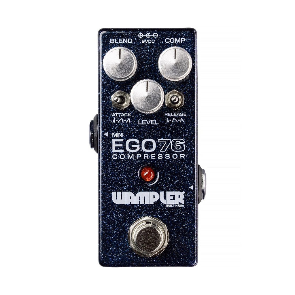 Dark blue guitar compressor pedal with knobs for blend, comp, level, two toggle switches, and a footswitch.