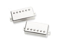 Two nickel-covered humbucker guitar pickups with six adjustable pole screws each on a white background.
