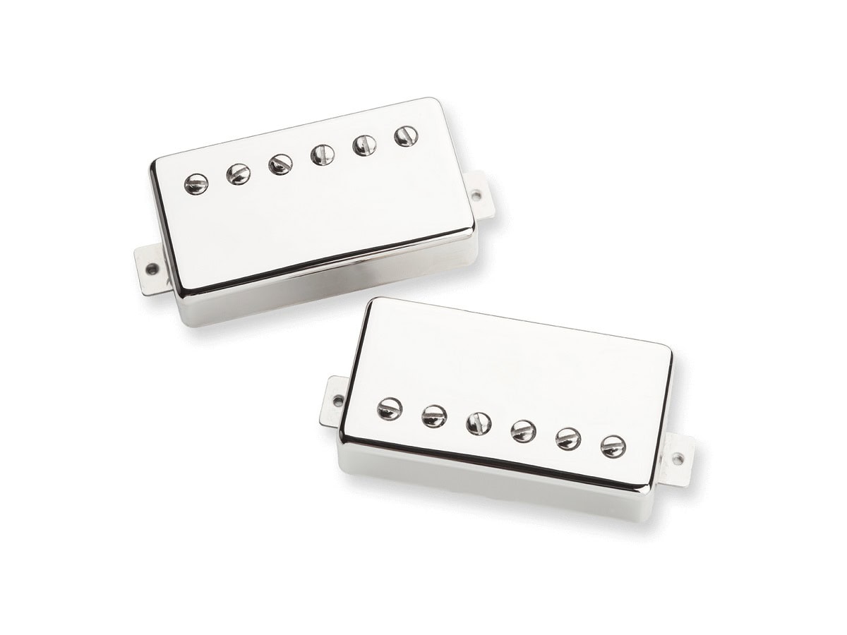 Two nickel-covered humbucker guitar pickups with six adjustable pole screws each on a white background.