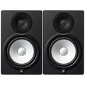 Pair of black studio monitors with silver cones and Yamaha logos at the bottom.