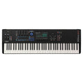 Black 76-key keyboard synthesizer with multiple controls, display screen, and Yamaha branding.