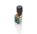 Black rotary knob mounted on a small circuit board with visible pins.