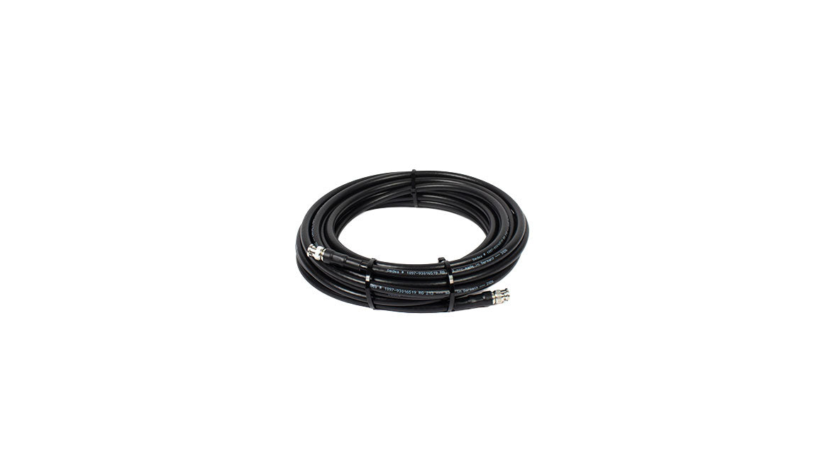 Coiled black cable with circular coaxial connectors on both ends