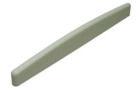 Off-white radiused acoustic guitar saddle piece shown on white background.