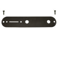 Black metal control plate with multiple holes and two screws shown on a white background.