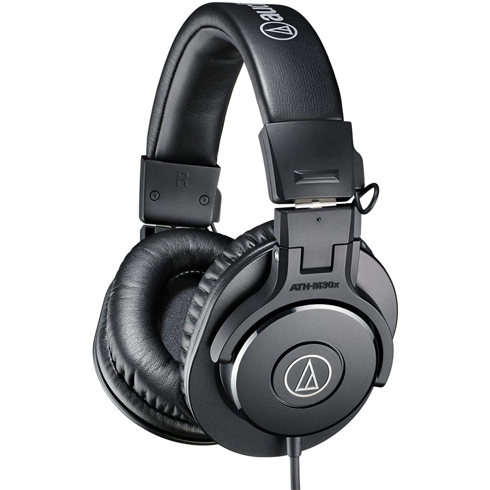 Black over-ear headphones with padded ear cups and headband, featuring wired cable and Audio Technica logo on ear cup.