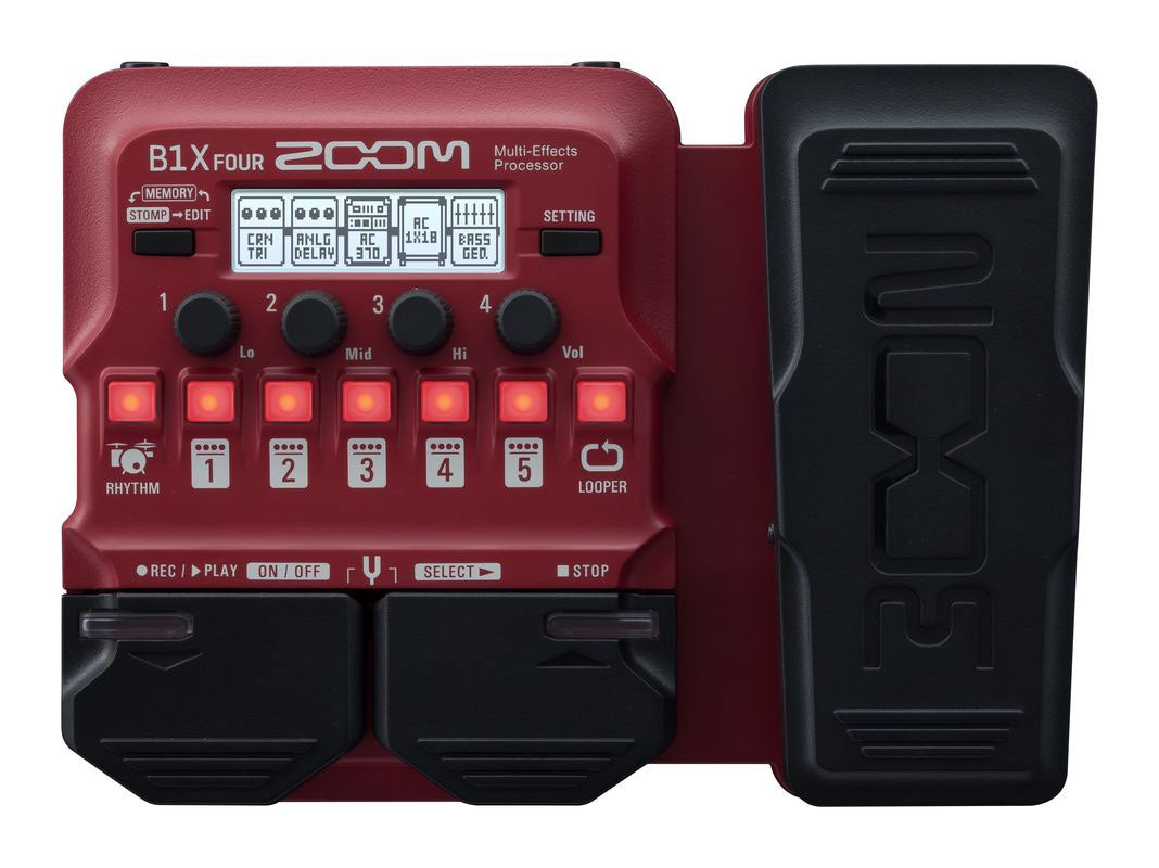 Red and black multi-effects processor pedal with knobs, buttons, foot pedals, and an expression pedal.