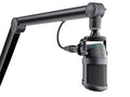 Black studio microphone mounted on an adjustable arm with visible metal mesh and XLR connector.