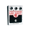 Electro-Harmonix Big Muff pedal with volume, tone, and sustain knobs and a footswitch on a silver and black enclosure.