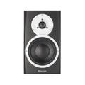 Front view of a black and white studio monitor speaker with visible woofer and tweeter drivers.