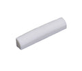 A white curved rectangular guitar nut with a flat bottom shown on a white background.
