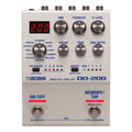 Silver Boss digital delay pedal with multiple knobs, switches, a digital display, and two footswitches.