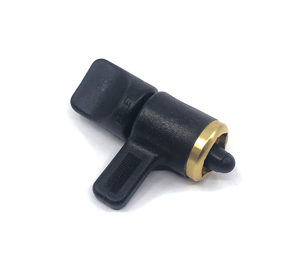 Black plastic guitar jack tightener with a gold metal ring and a lever control on a white background.
