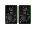 Front view of a pair of black studio monitor speakers with green borders and visible drivers.