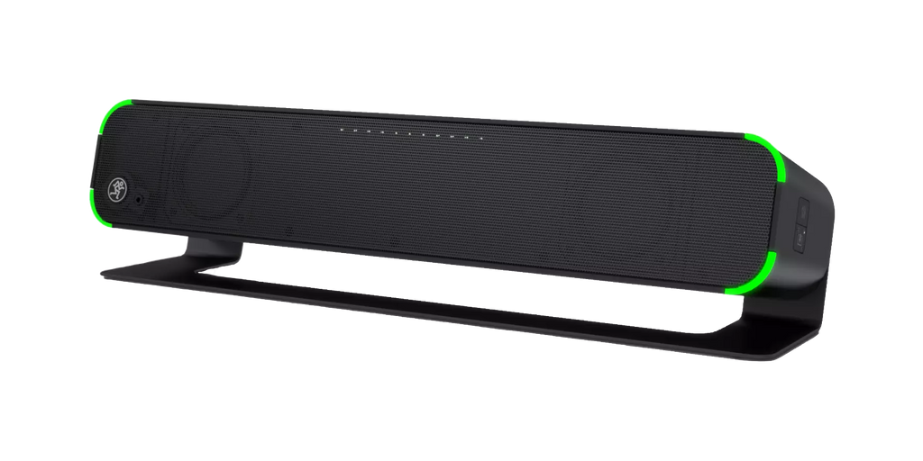 Black horizontal soundbar speaker with green corner accents mounted on a slim stand.
