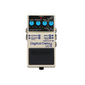 Top-down view of a beige guitar effects pedal with blue knobs and multiple input/output jacks labeled Digital Delay DD-8.