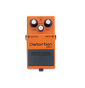 Orange guitar distortion effects pedal with three control knobs and input/output jacks.