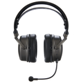 Black over-ear headphones with thick padded ear cups and an attached flexible microphone.