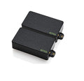Two black rectangular EMG guitar pickups with green EMG logo and metal mounting points.