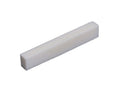Rectangular white flat-bottom bone guitar nut blank shown against a white background.