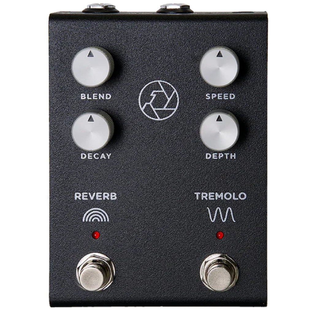 Black guitar effects pedal with four control knobs labeled Blend, Speed, Decay, Depth and two footswitches labeled Reverb and Tremolo.